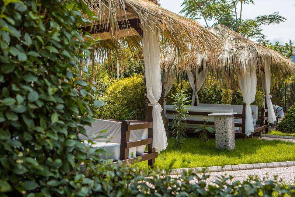 Een foto van het terras bij L'Ancora Beach