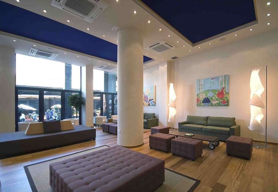 Een foto van het interieur van Athens Center Square Hotel