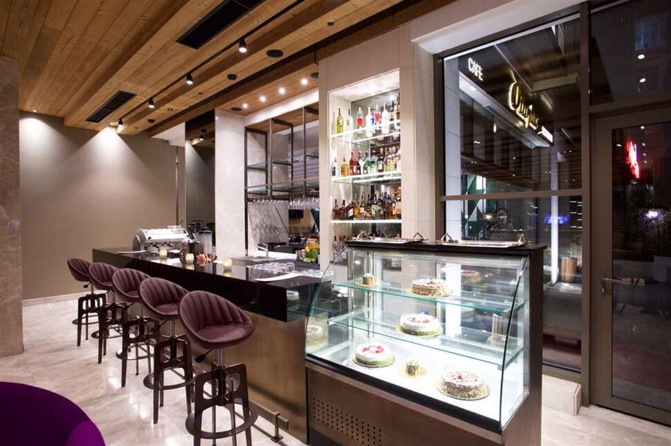 Ein Foto Dosso Dossi Hotels Downtown