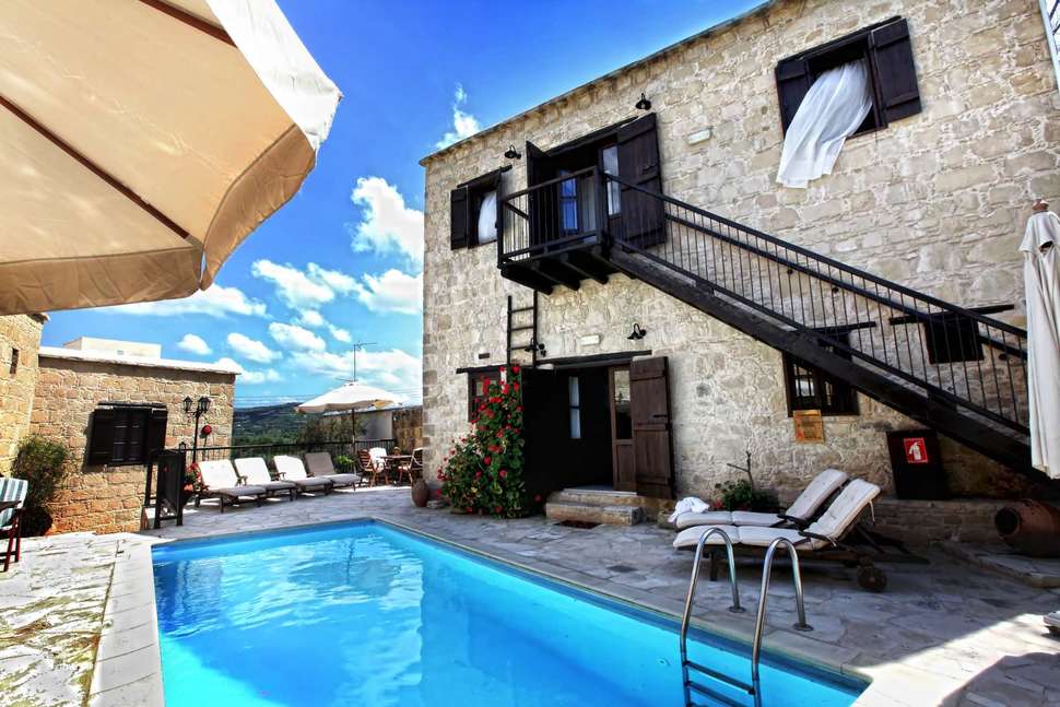 Een foto van het zwembad bij Leonidas Village Houses