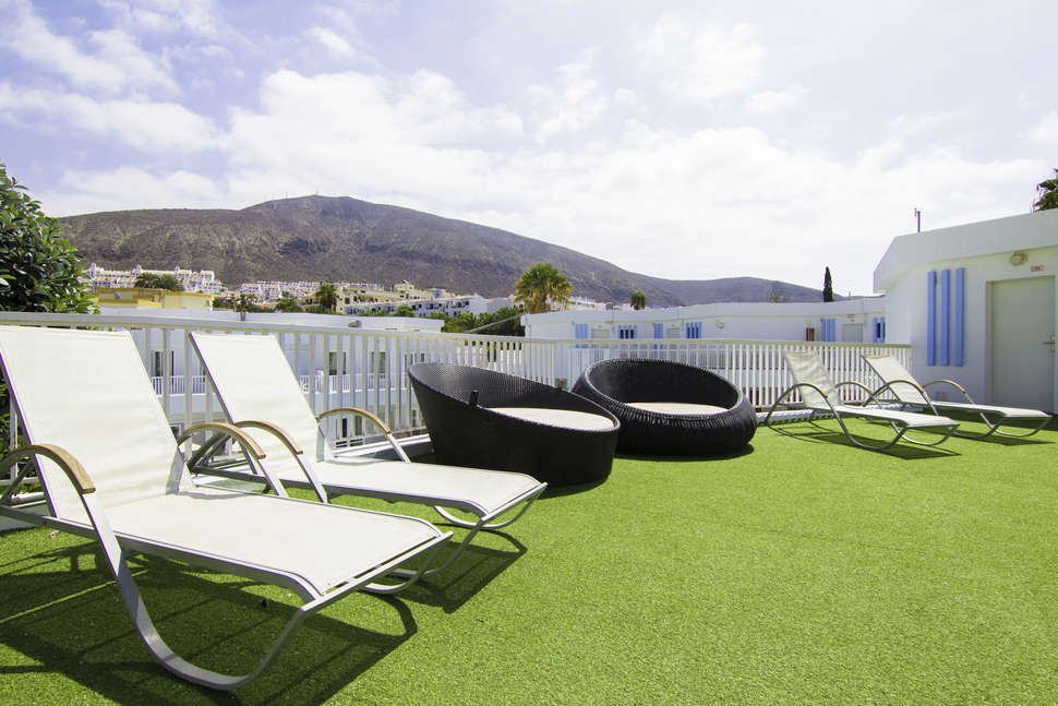 Een foto van het terras bij Checkin Bungalows Atlantida