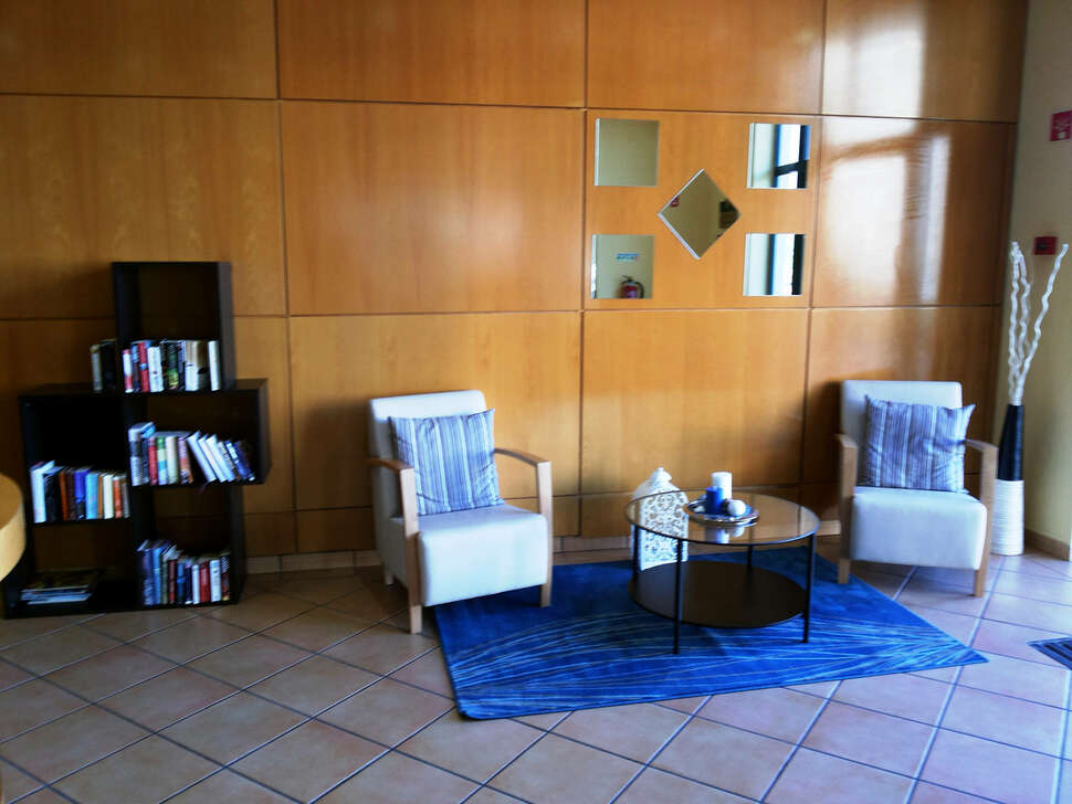 Een foto van het interieur van Plaza Real Aparthotel