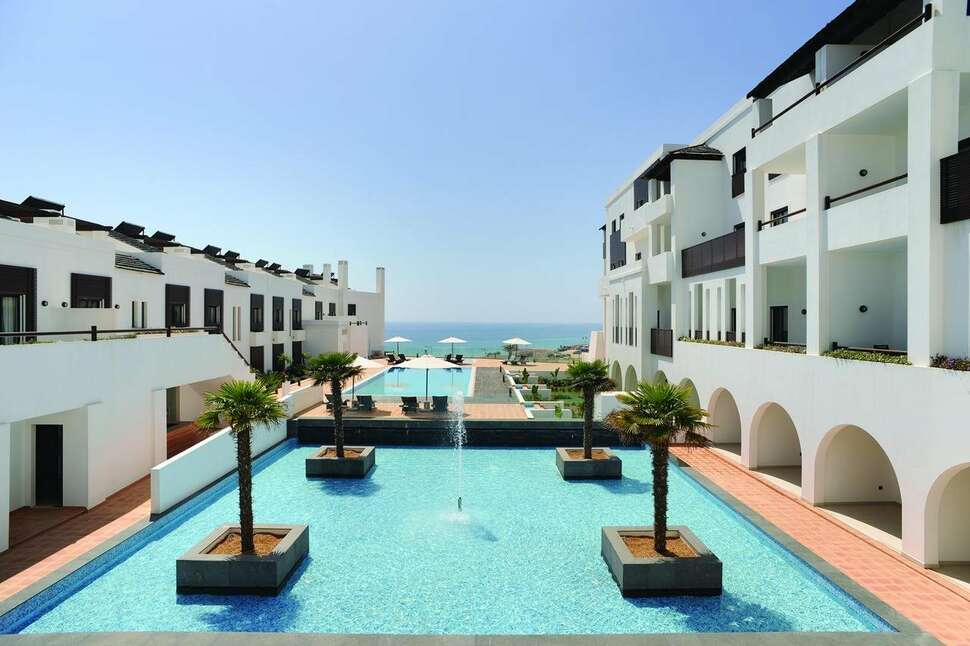 Een foto van het zwembad bij Belmar Spa & Beach Resort