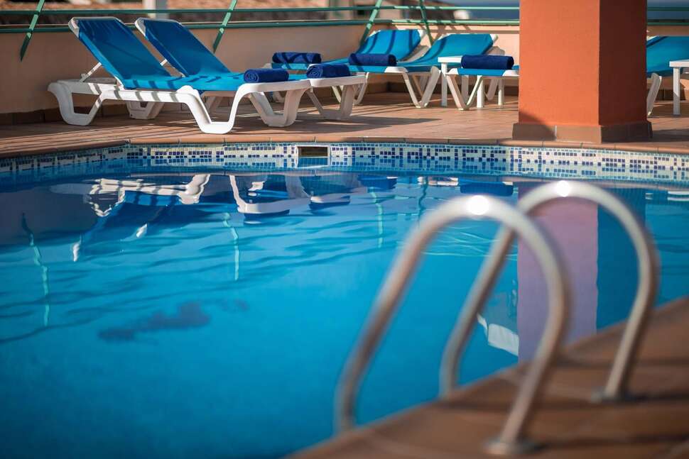 Een foto van het zwembad bij H-Top Royal Sun Suites