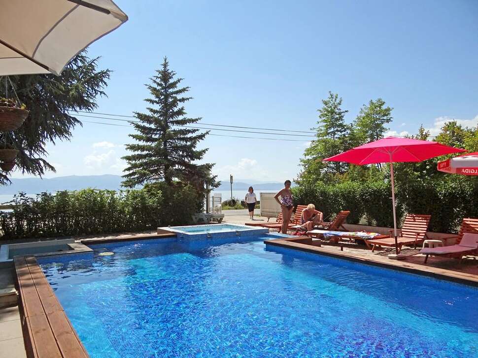 Een foto van het zwembad bij Villa Dionis
