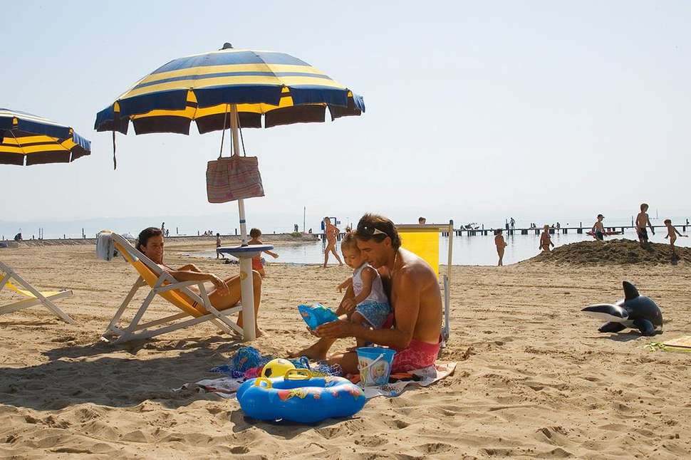Een foto van het strand bij Club Del Sole Tenuta Primero Grado Family Collection