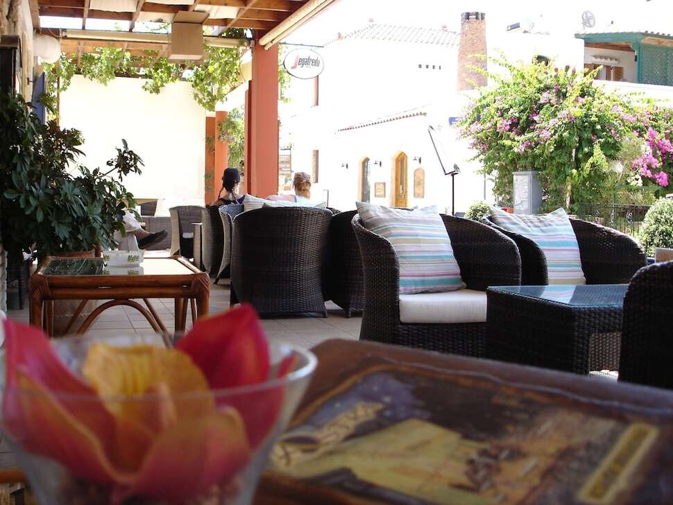 Een foto van het terras bij Astra Village