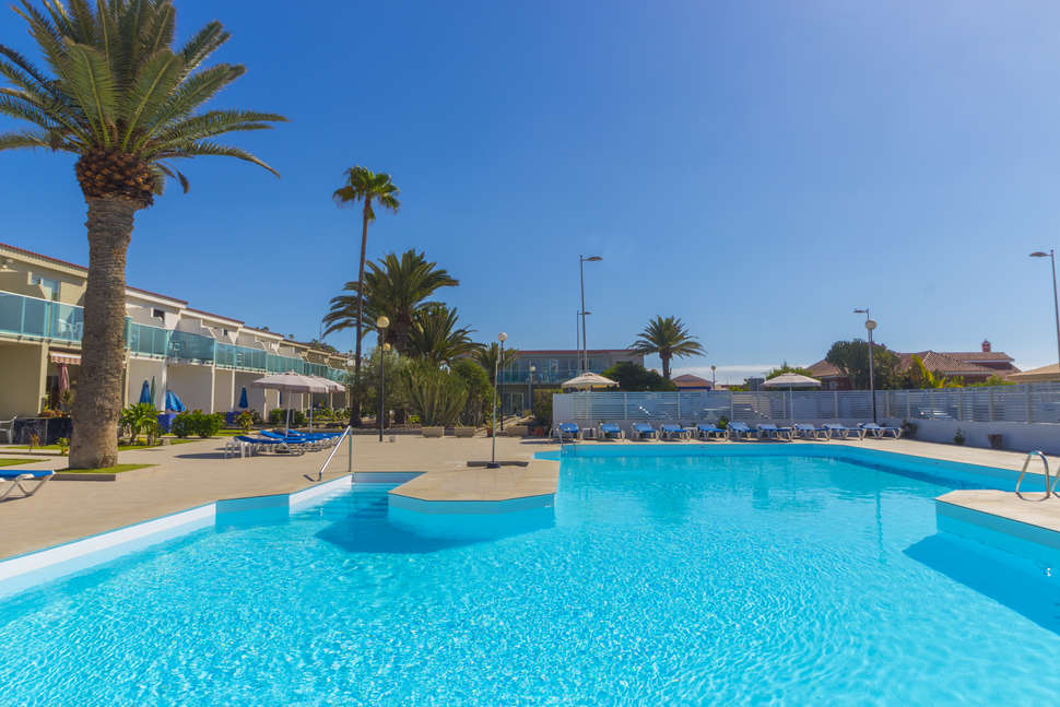 Een foto van het zwembad bij Bungalows Corinto II