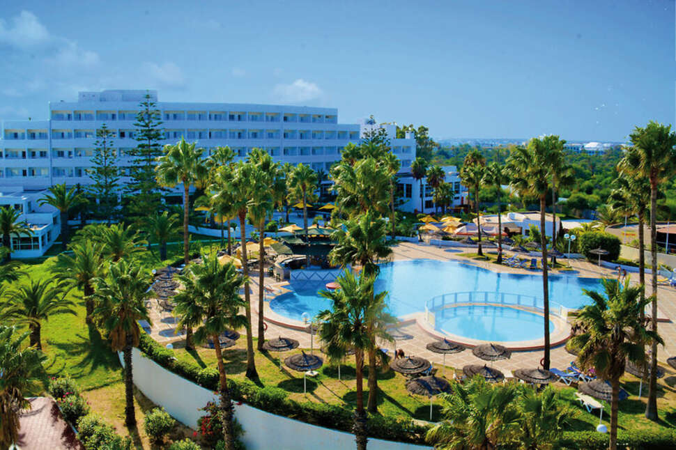 Een foto van het zwembad bij Hotel Club Tropicana & Spa