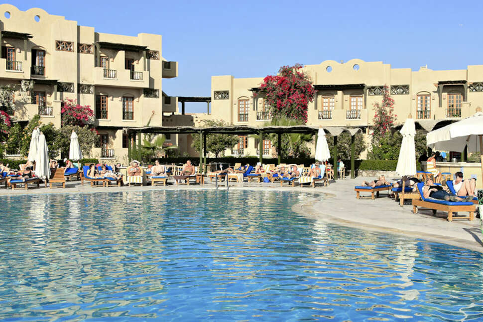 Een foto van het strand bij The Three Corners Rihana Inn