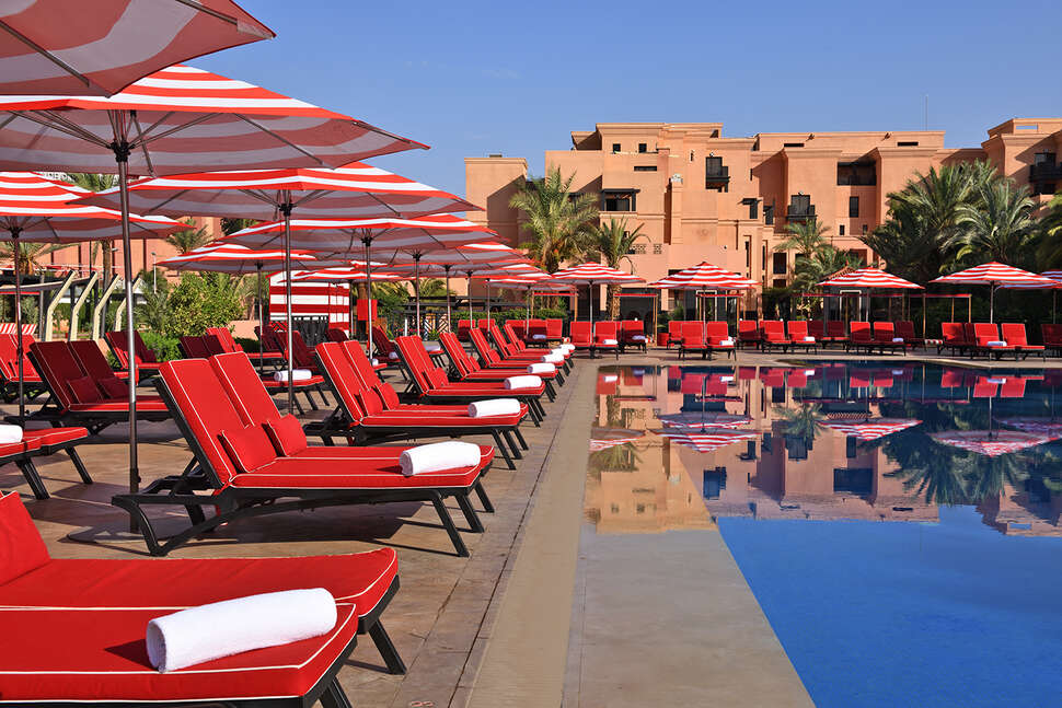 Een foto van het zwembad bij Mövenpick Hotel Mansour Eddahbi Marrakech