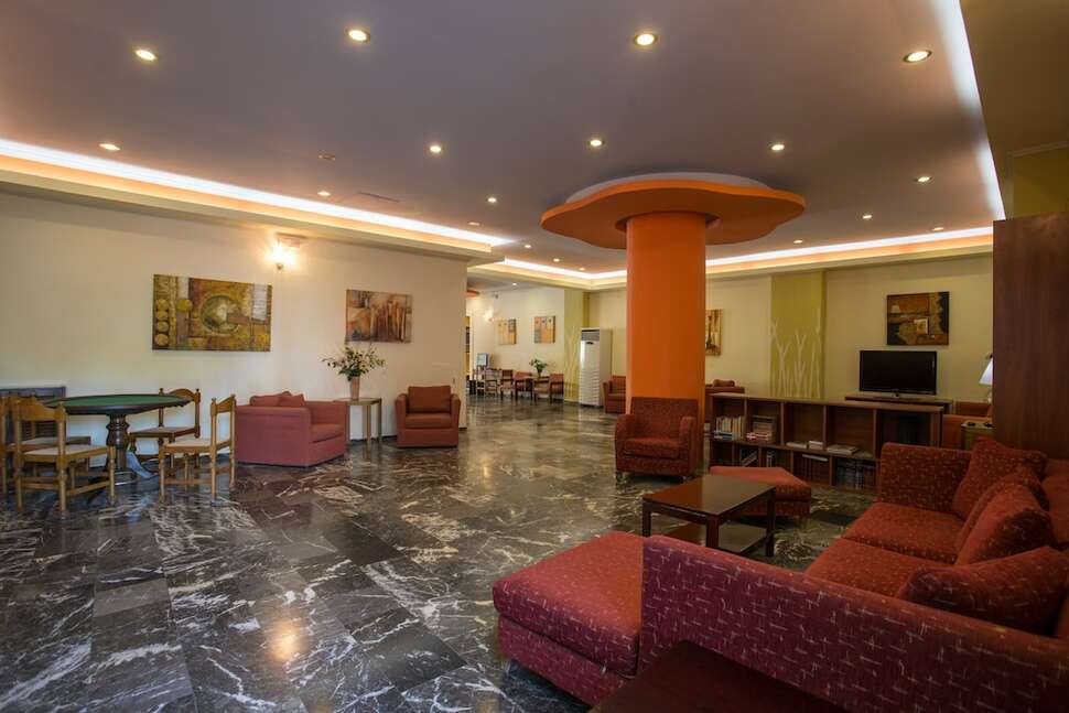 Een foto van het interieur van Popi Star Hotel