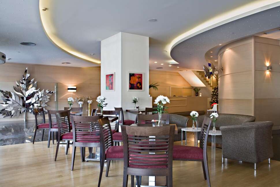 Een foto van het interieur van Amalia Hotel Athens