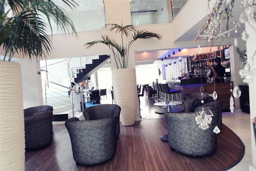 Een foto van het interieur van Livadhiotis City Hotel