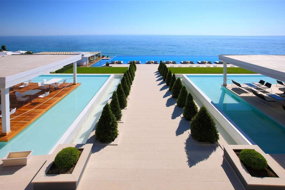 Een foto van het zwembad bij Cavo Olympo Luxury Hotel & Spa