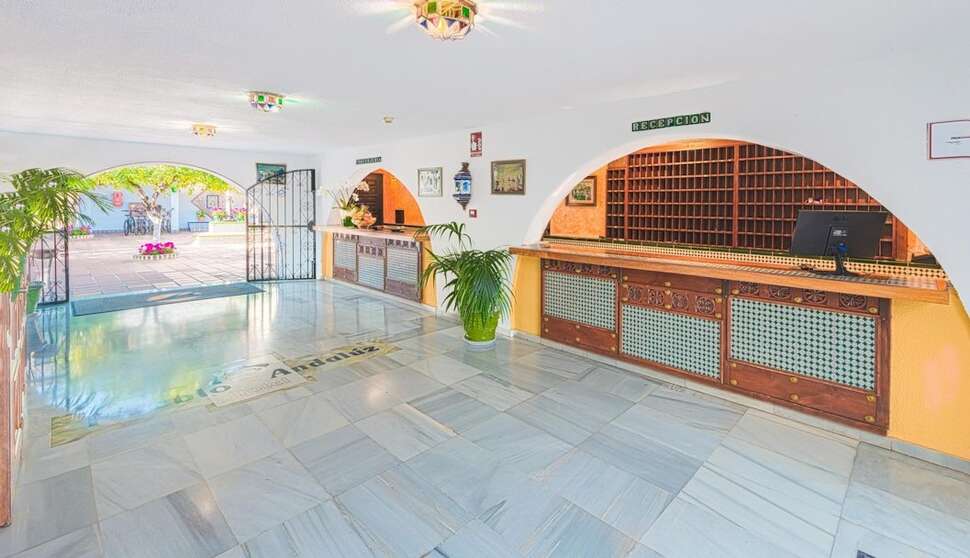 Een foto van het interieur van Globales Pueblo Andaluz