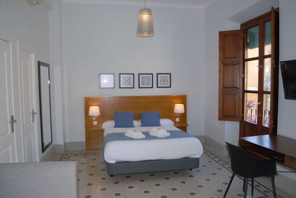 Een foto van La Perla Granada Suites