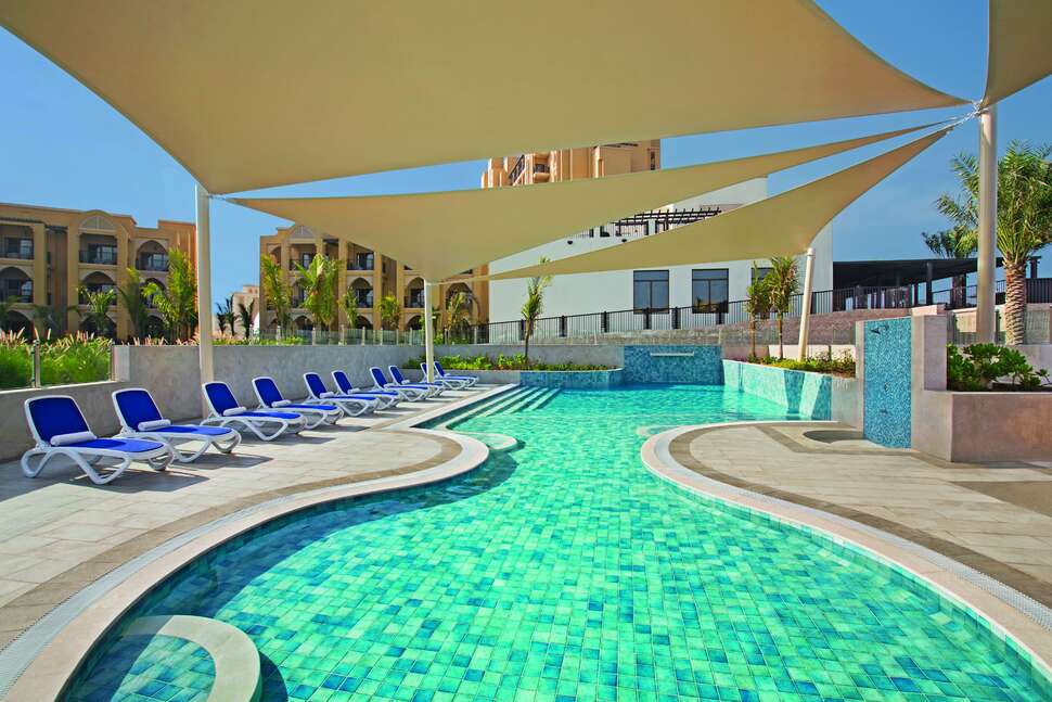 Ein Foto vom Pool im DoubleTree by Hilton Resort & Spa Marjan Island
