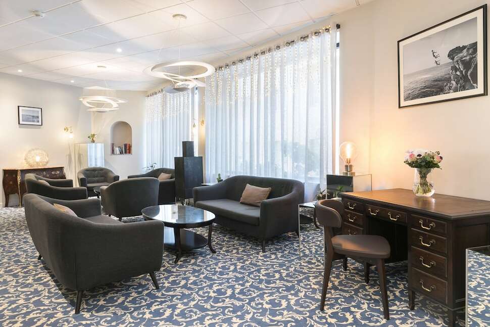 Een foto van het interieur van Hotel Locarno