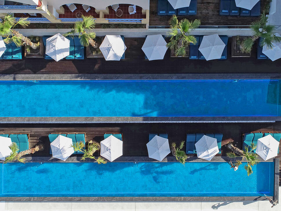 Een foto van het zwembad bij Mitsis Summer Palace Beach Hotel