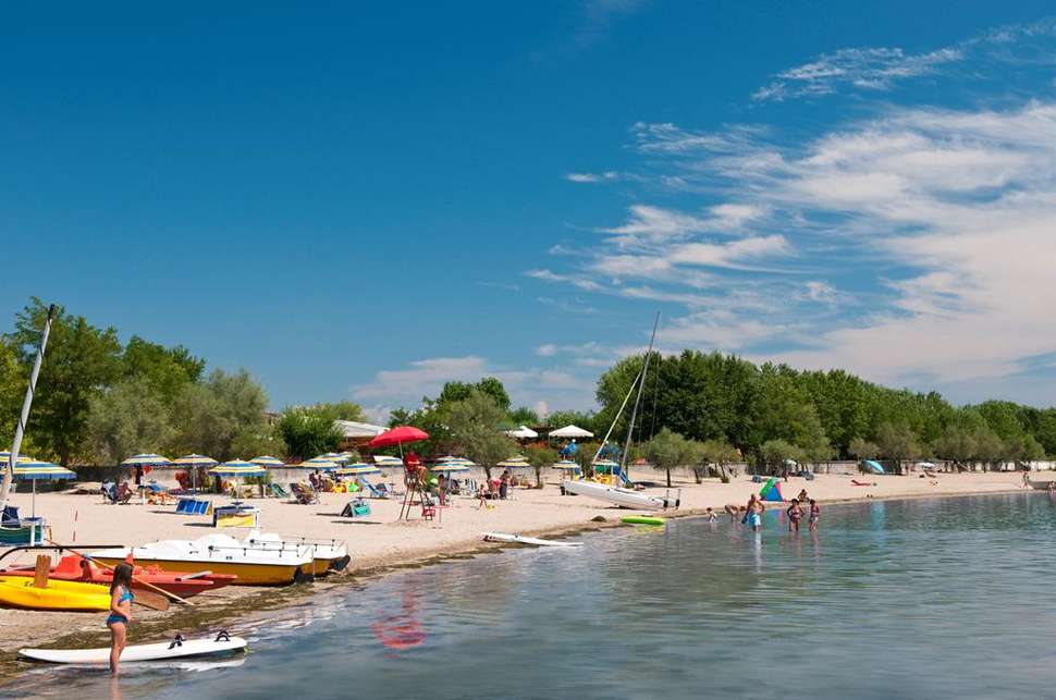 Een foto van het strand bij Club Del Sole Tenuta Primero Grado Family Collection
