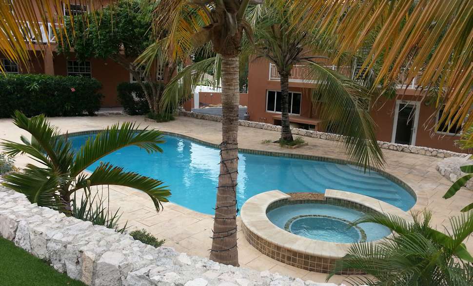 Een foto van het zwembad bij Curinjo Resort