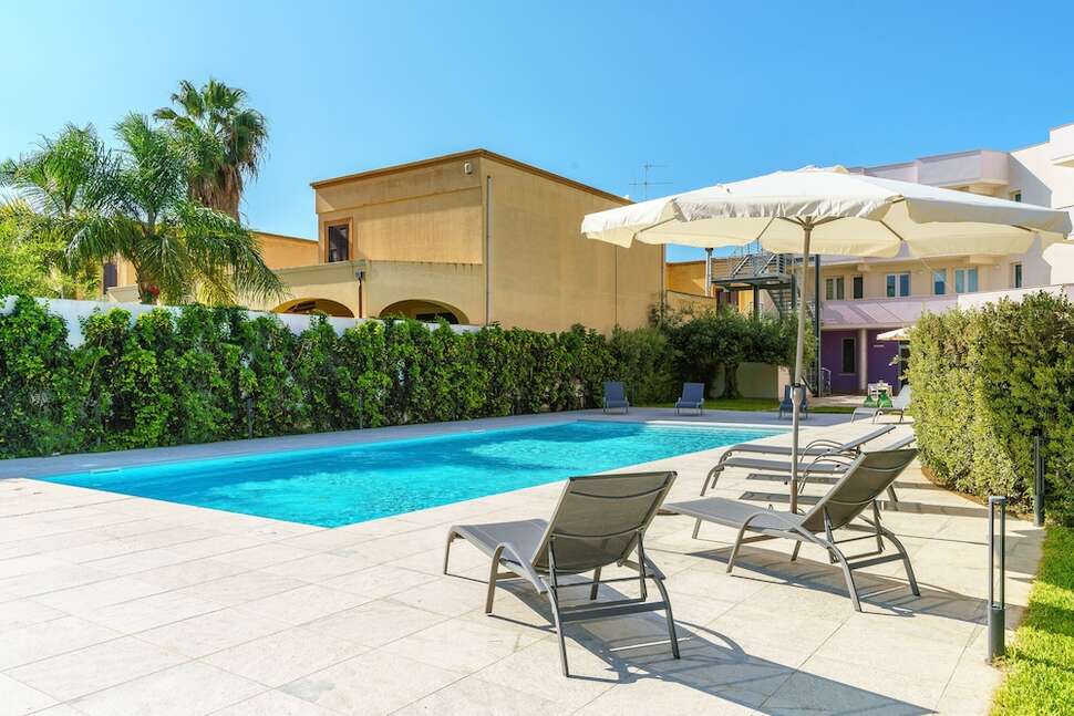 Travini Hotel Residence cover