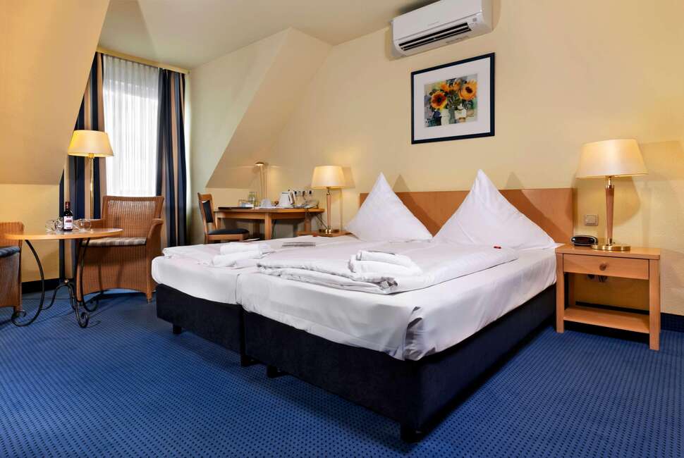 Tryp by Wyndham Lubeck Aquamarin Hotel.